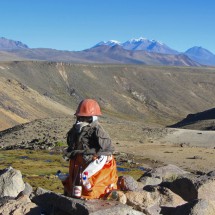 Weird guy at Patapampa with snowy Nevado Chachani in the background